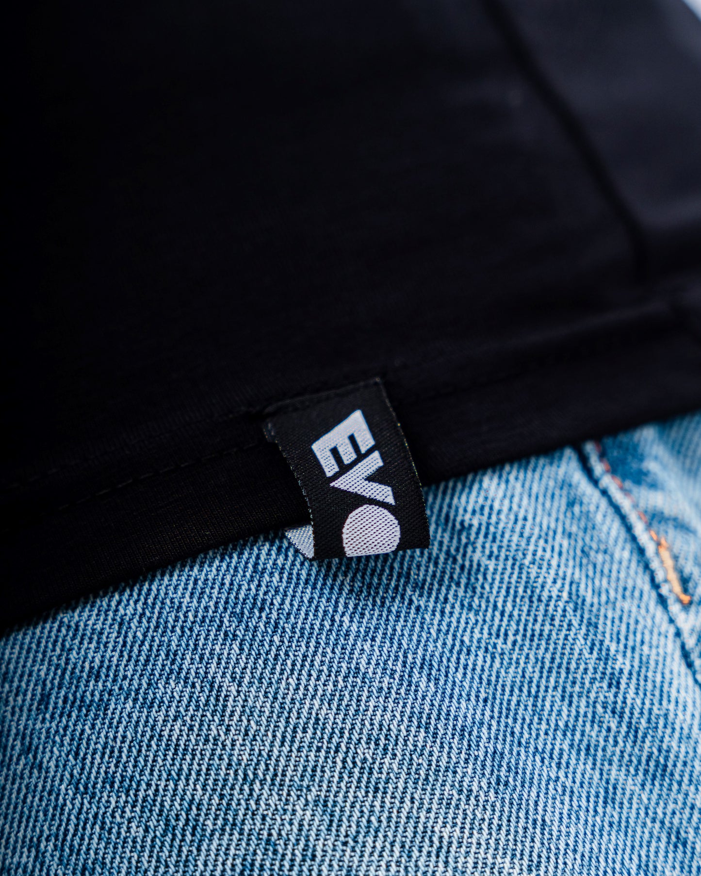 EVOLVE® BLACK MUSCLE TEE